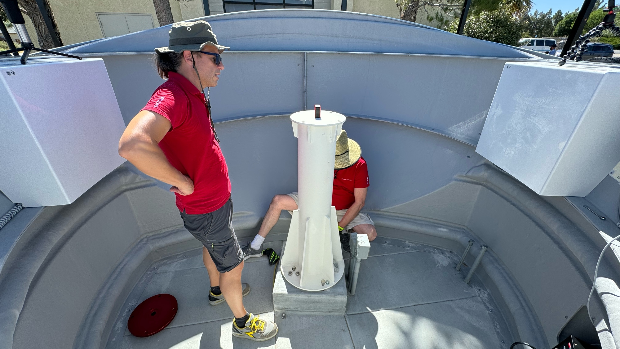 DUAL-COMPACT Observatory Station installed in San Bernardino County: fixing and levelling pier on the concrete base